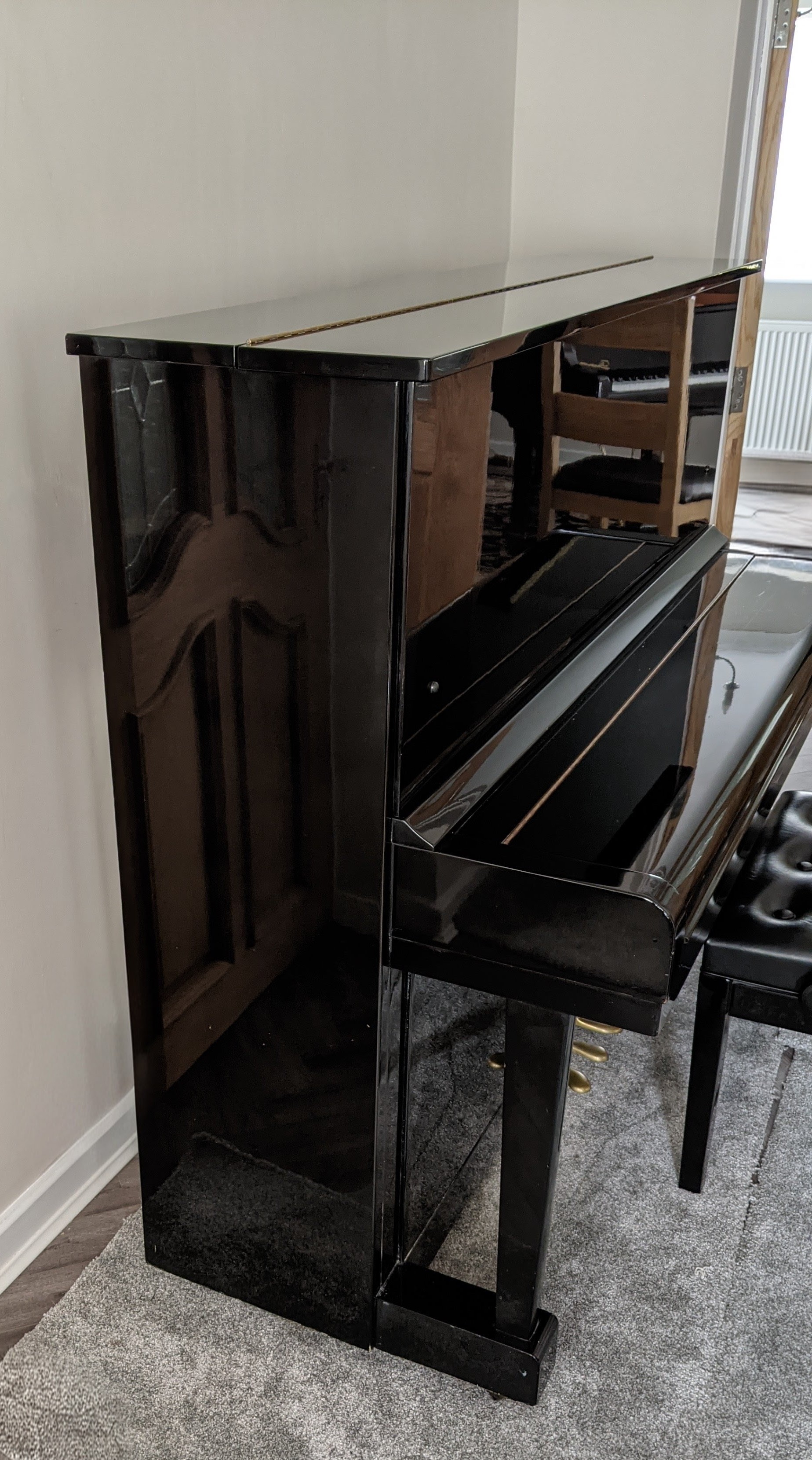 Side view of the Seiler and Helman Upright Piano 1977