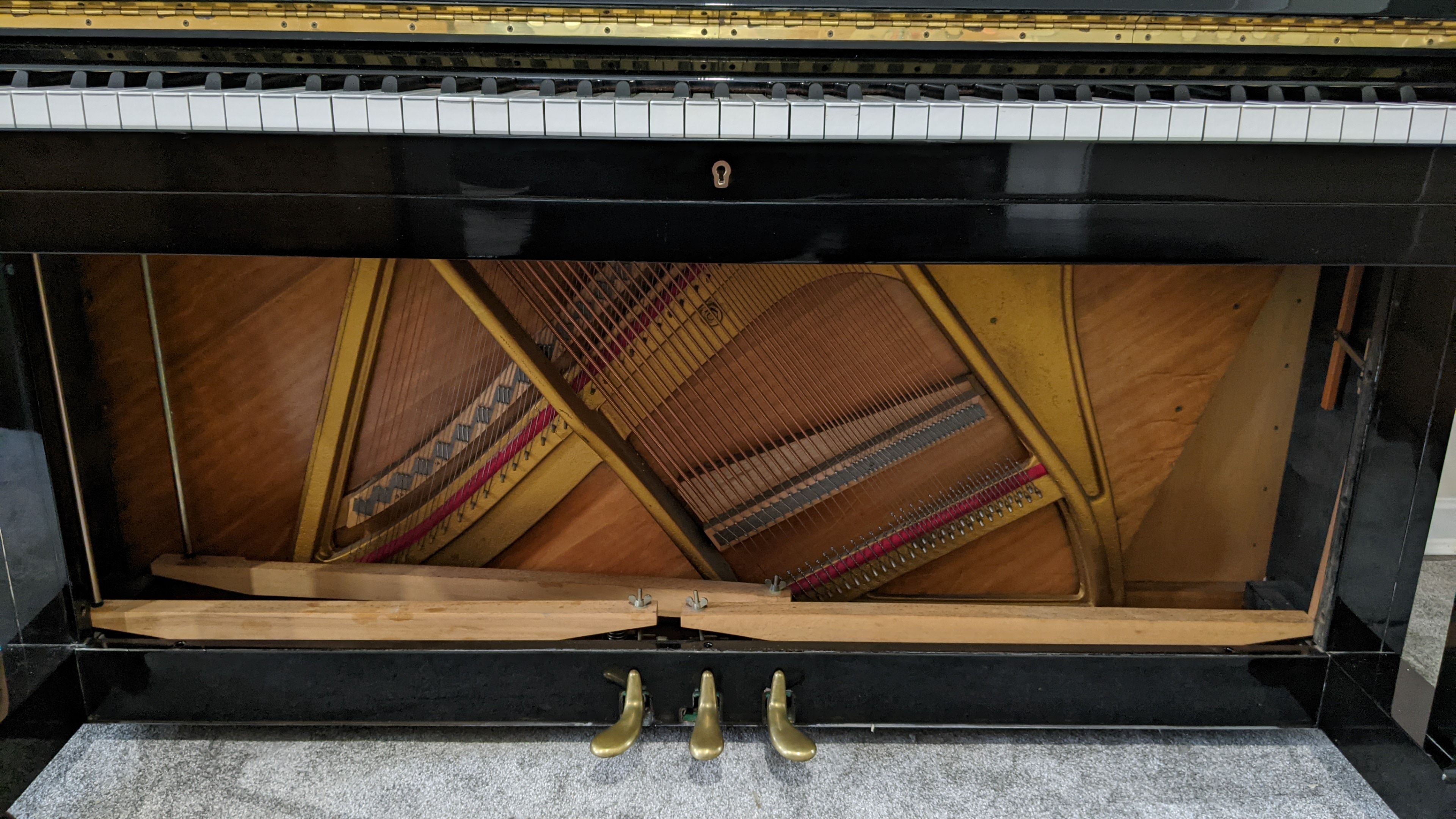 Seiler and Helman Upright Piano view of pedials and trap work